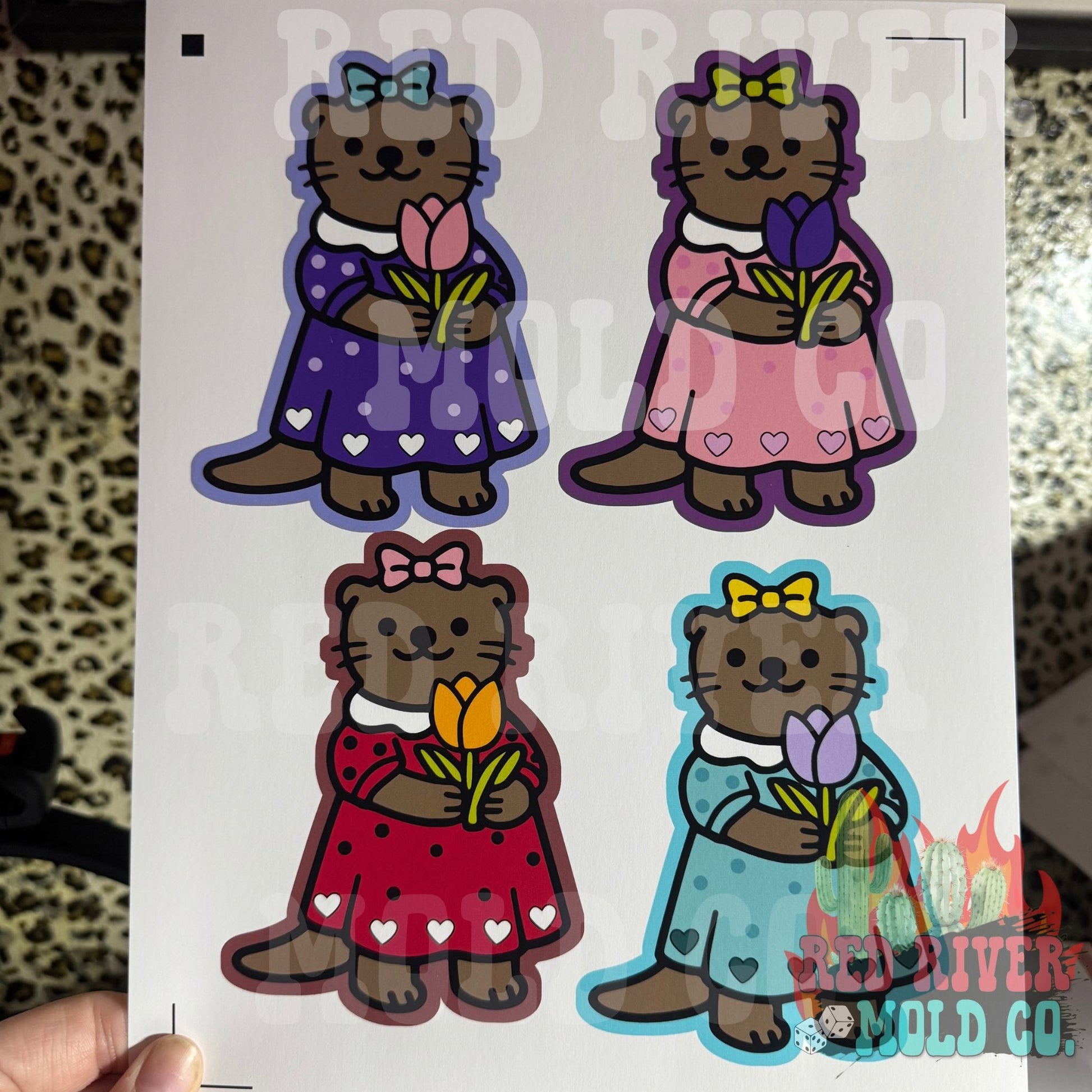 Red River Mold Baby Otter Holding a Tulip cardstock grab bag - Red River Mold Co